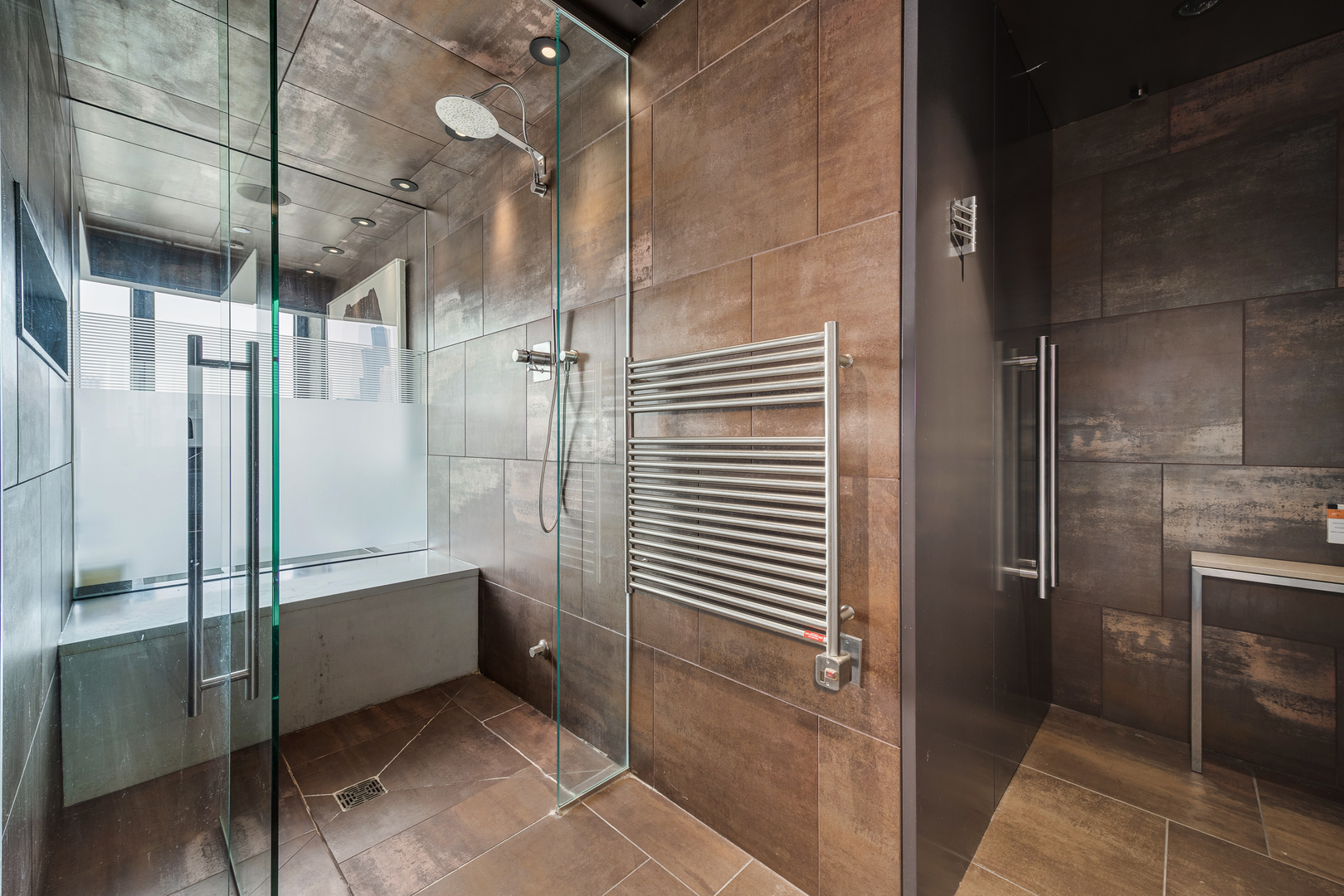 1530 South State Street, Unit 18AB Chicago, IL 60605 - Photo 29 of 54 a bathroom with a bathtub and shower