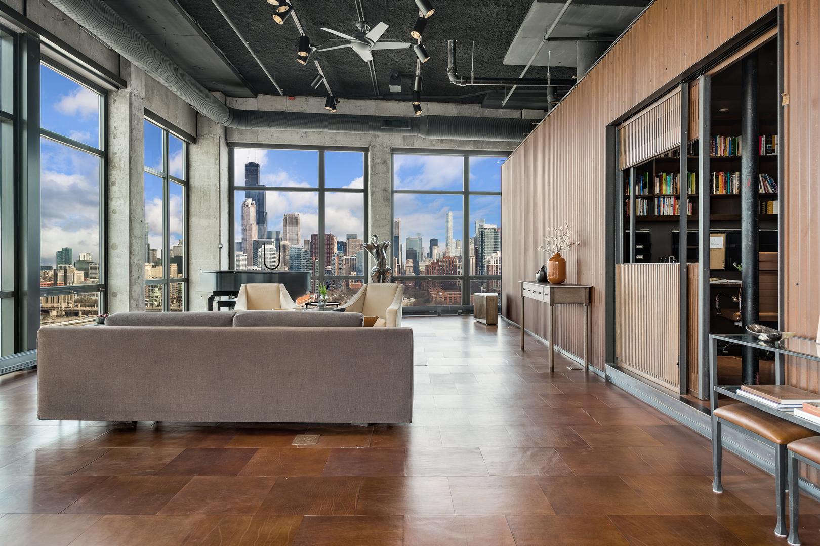 1530 South State Street, Unit 18AB Chicago, IL 60605 - Photo 4 of 54 a living room with furniture large window and wooden floor