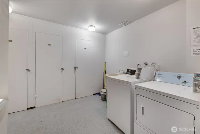 a view of a garage with parked cars