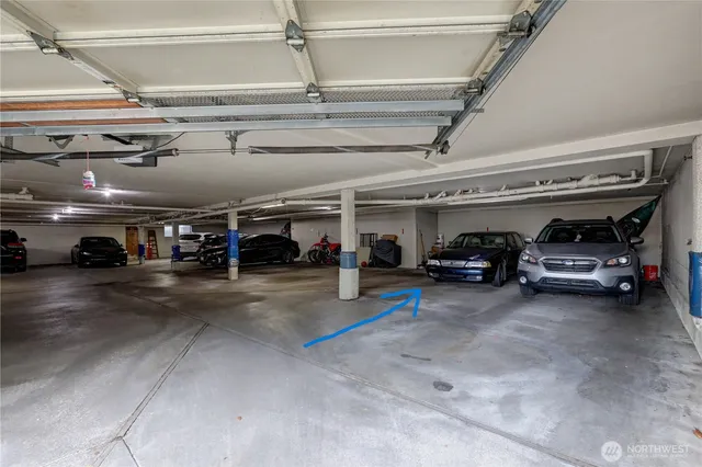 a car parked in front of brick building