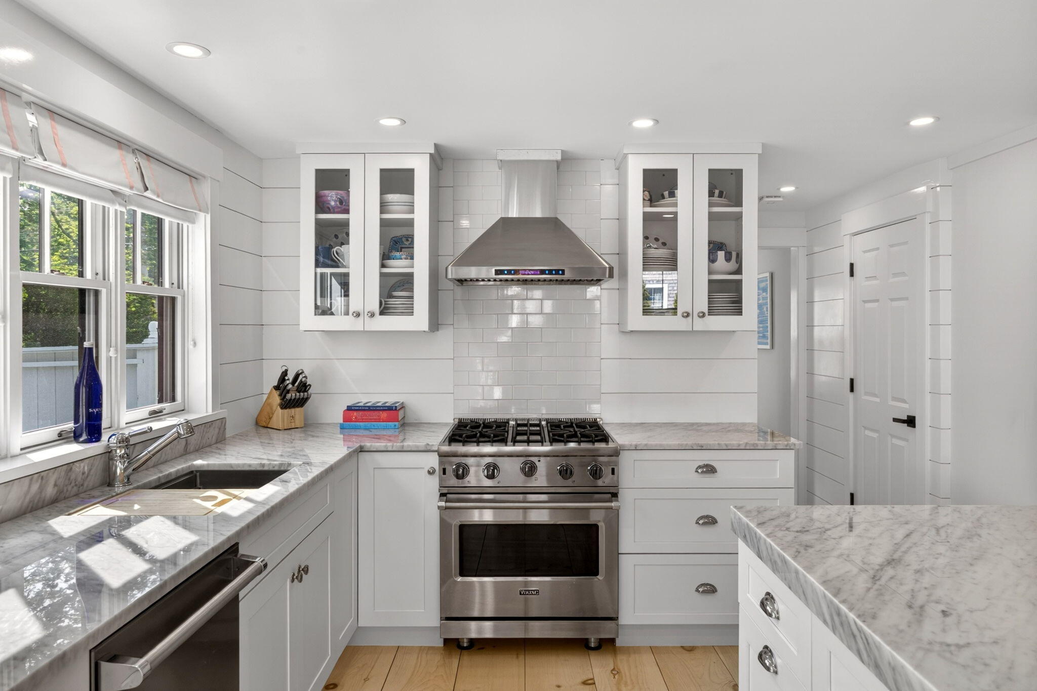 320 Old Harbor Road Chatham, MA 02633 - Photo 20 of 58 a kitchen with a stove and a sink