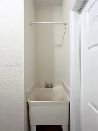 a bathroom with a sink and a shower
