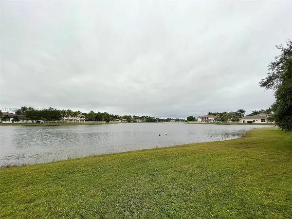 a view of a lake from a city