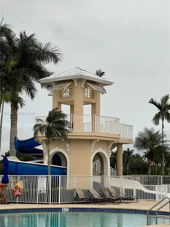 a front view of house with yard and outdoor seating
