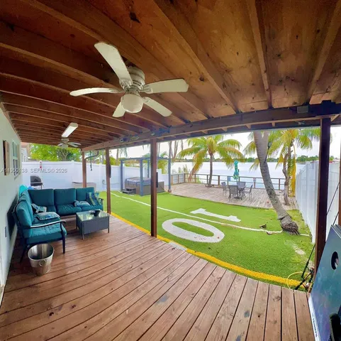 a view of swimming pool with a patio