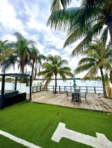 a view of a yard and patio