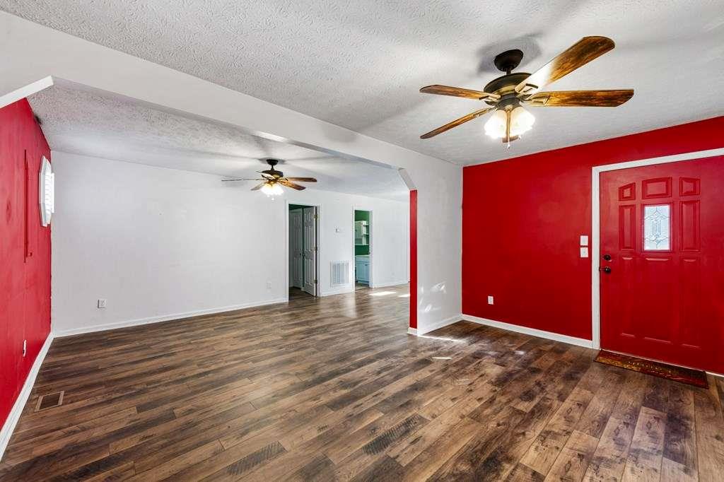 118 Jordan Road Blairsville, GA 30512 - Photo 2 of 49 a view of a livingroom with a ceiling fan