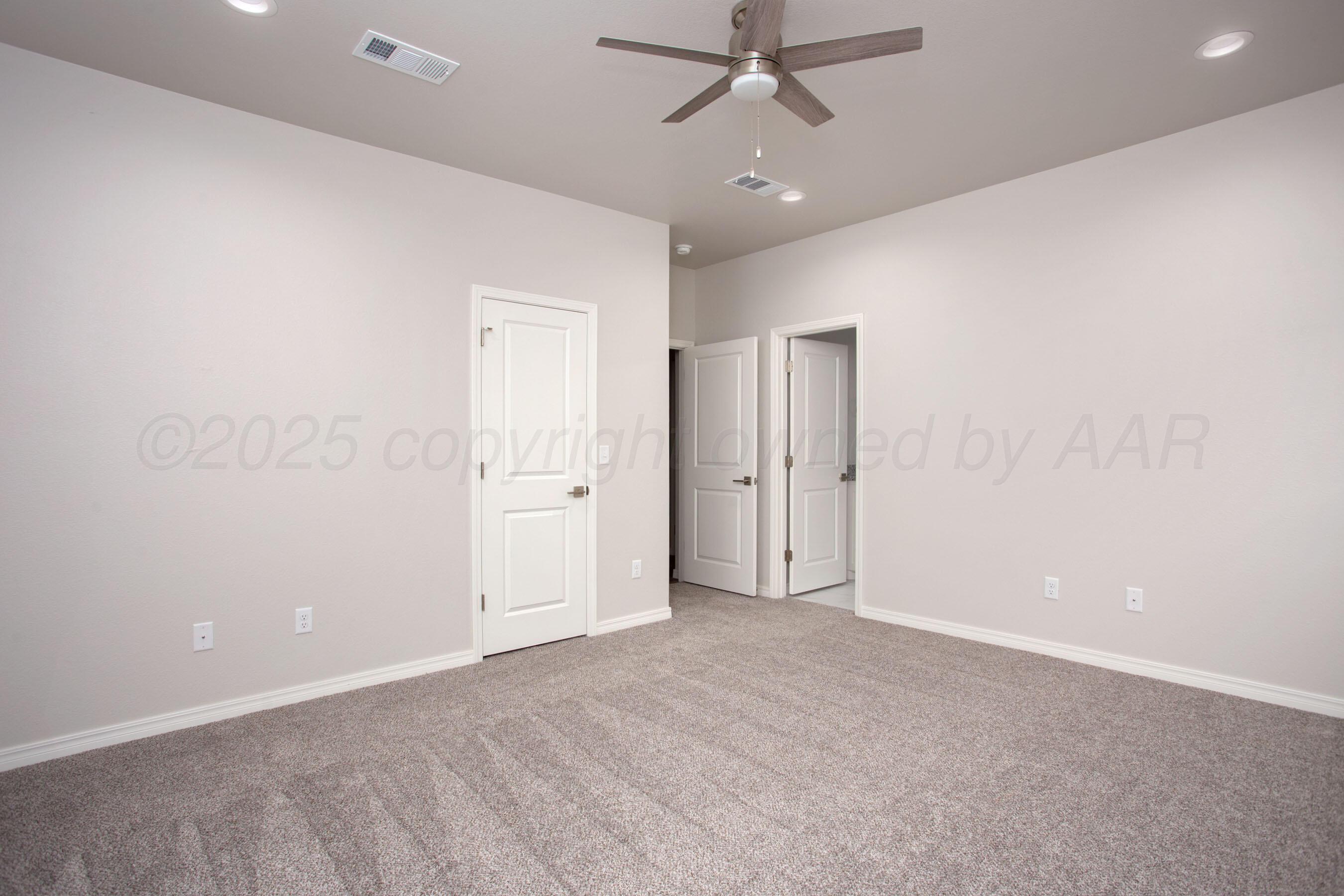 22131 Howard Draw Rd Canyon Canyon, TX 79015 - Photo 16 of 25 wooden floor in an empty room