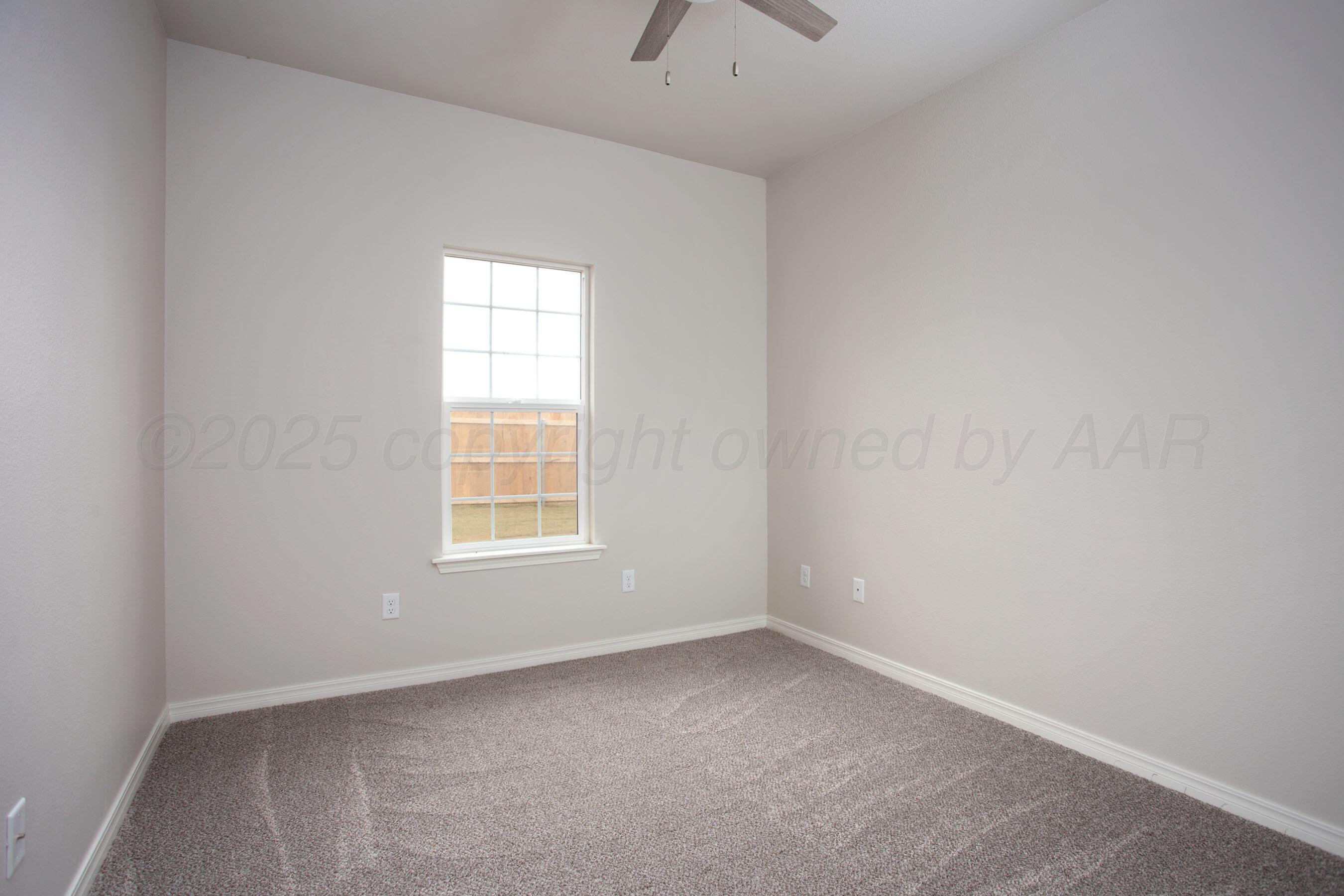 22131 Howard Draw Rd Canyon Canyon, TX 79015 - Photo 19 of 25 an empty room with a window