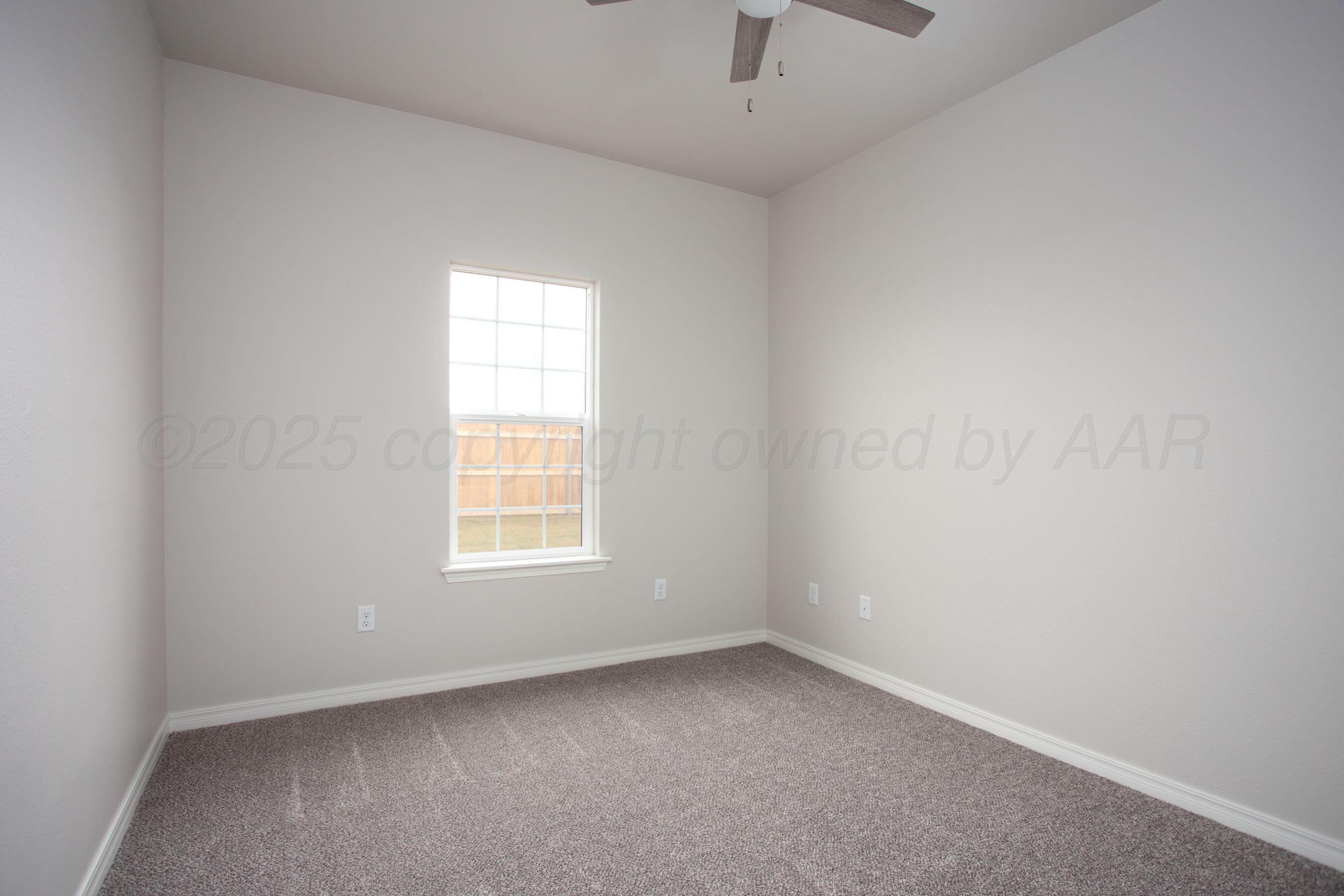 22131 Howard Draw Rd Canyon Canyon, TX 79015 - Photo 21 of 25 an empty room with a window