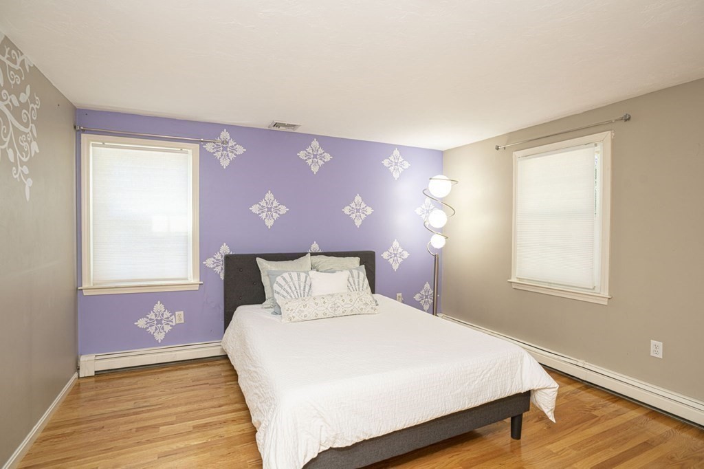 2 Toni Lane Franklin, MA 02038 - Photo 17 of 24 a bedroom with a bed and a window