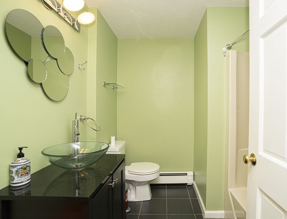 2 Toni Lane Franklin, MA 02038 - Photo 20 of 24 a bathroom with a sink and a mirror
