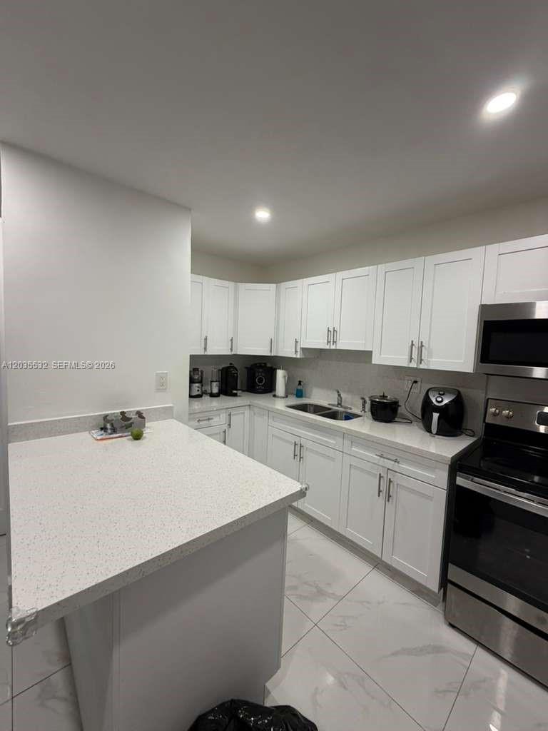 8246 Southwest 147th Court Miami, FL 33193 - Photo 6 of 26