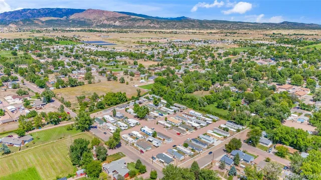 a view of a city with mountains in the background