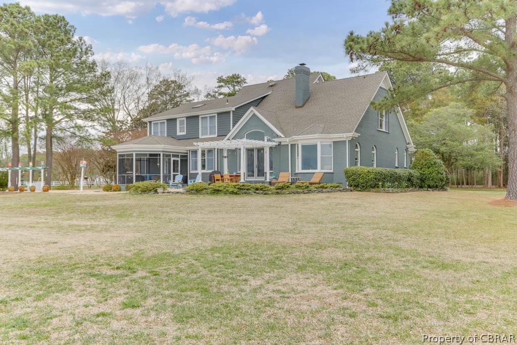 3459 Stonewall Road Hayes, VA 23072 - Photo 47 of 50 Lots of sitting space with screened porch and patio with the pergola. Most of the yard has an invisible fence for your pets if needed.