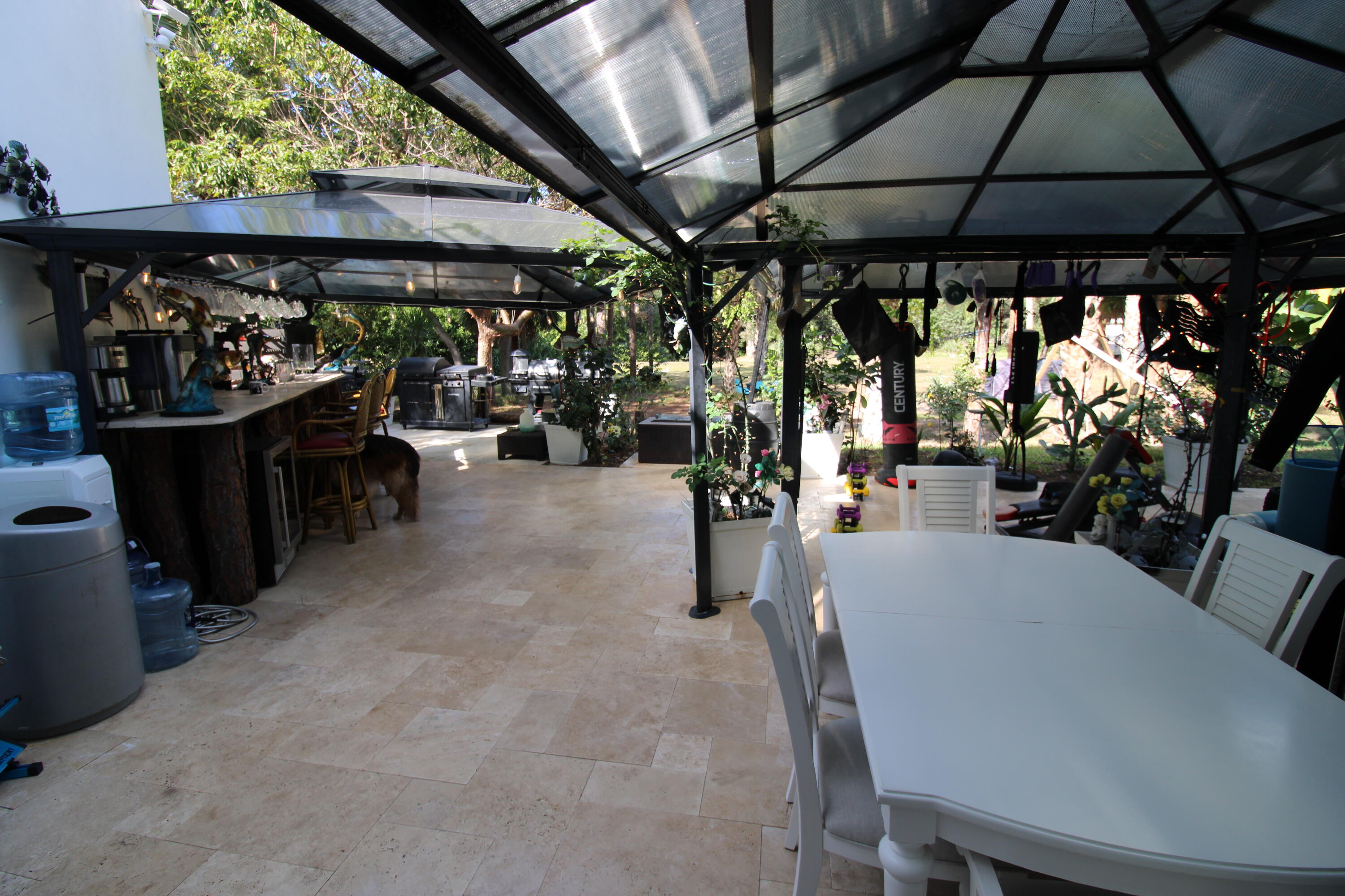 930 Rambling Dr Circle Wellington, FL 33414 - Photo 3 of 31 Luxury covered outdood facilities: Bar,