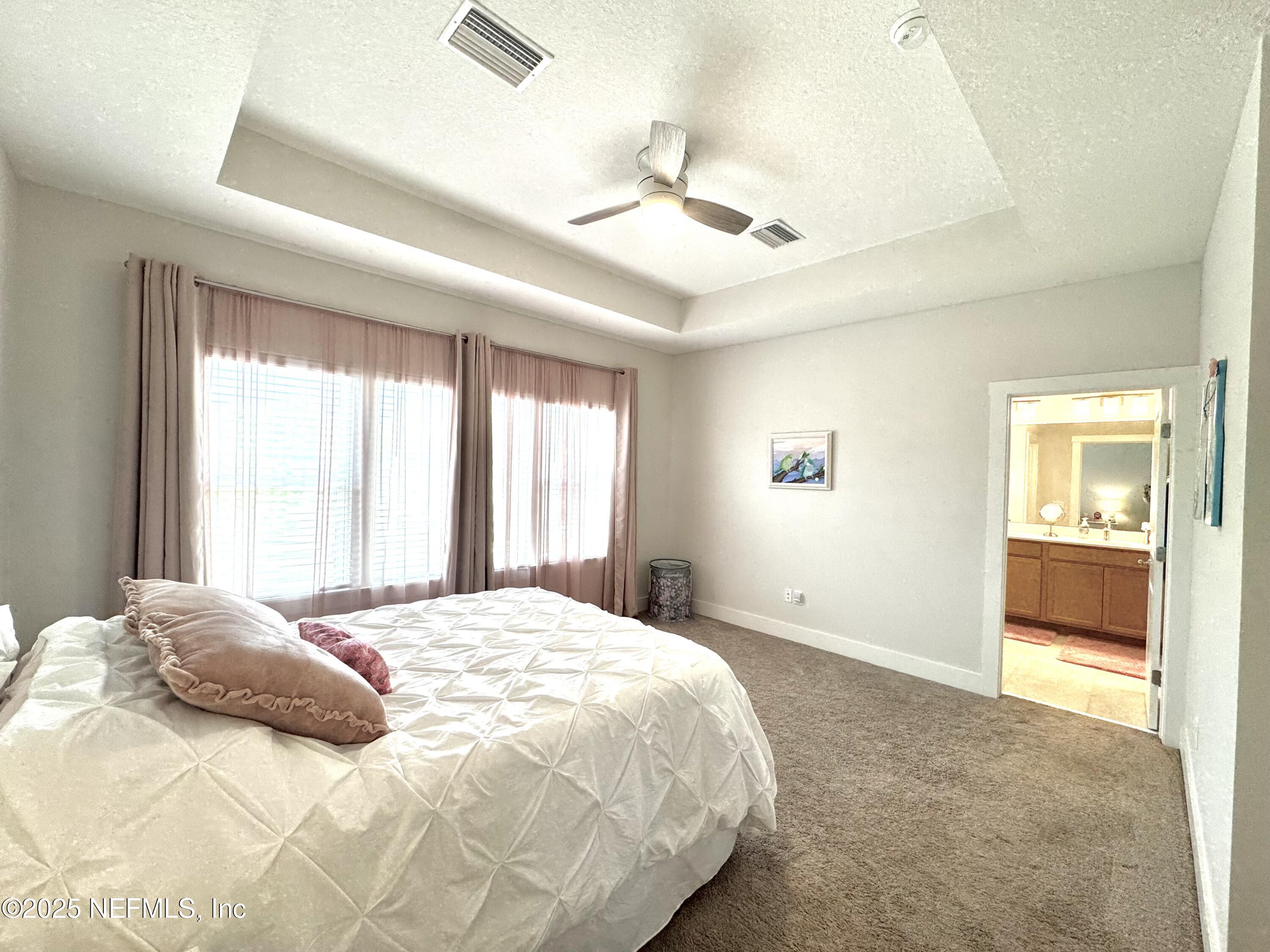 9860 Element Road Jacksonville, FL 32256 - Photo 17 of 35 Primary Bedroom