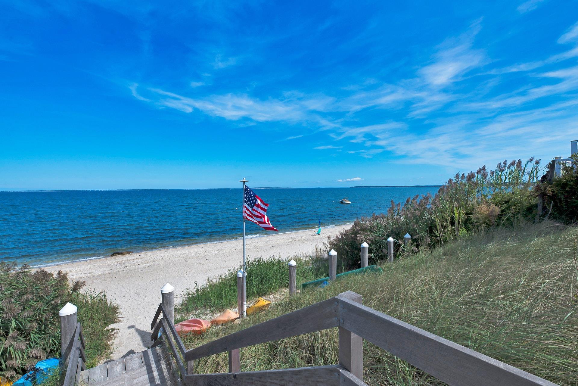 11 Oakhurst Road Hampton Bays, NY 11946 - Photo 18 of 20 a view of a terrace with lawn chairs