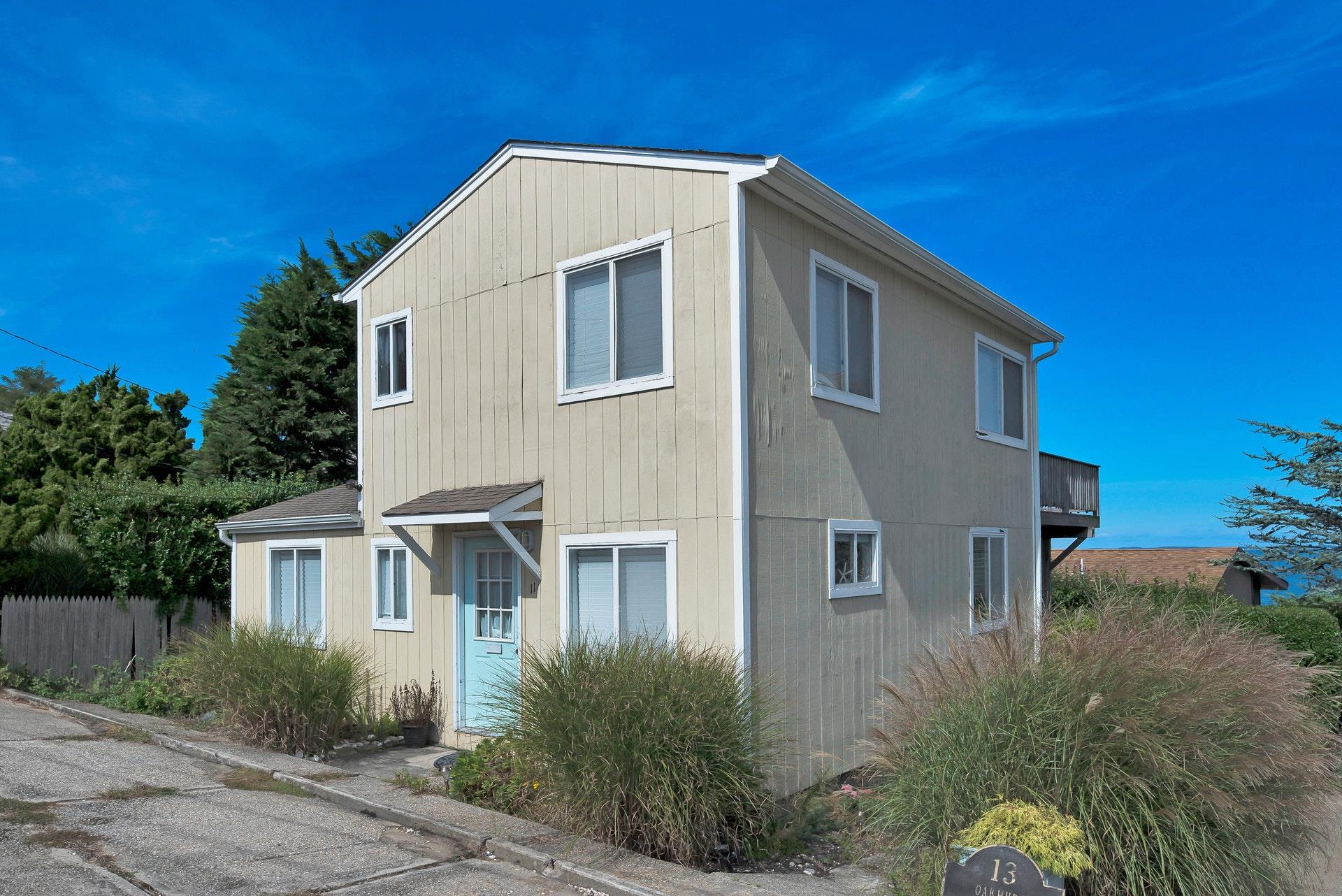 11 Oakhurst Road Hampton Bays, NY 11946 - Photo 2 of 20 a house view with a outdoor space