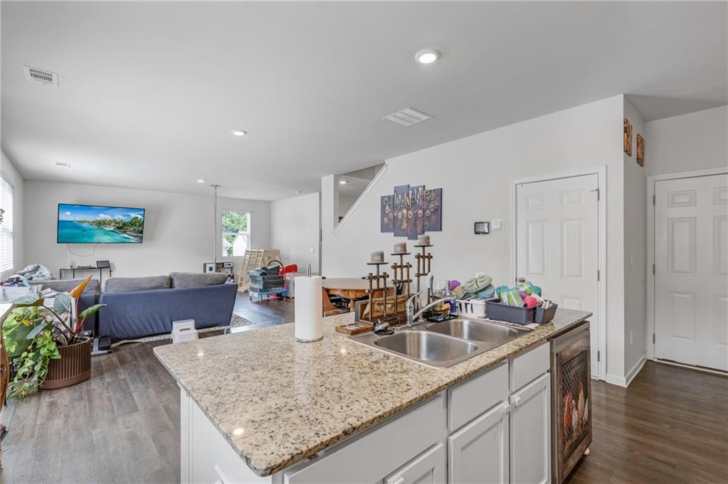 575 Walnut Grv Way Pendergrass, GA 30567 - Photo 13 of 39 a kitchen view with sink and living room view