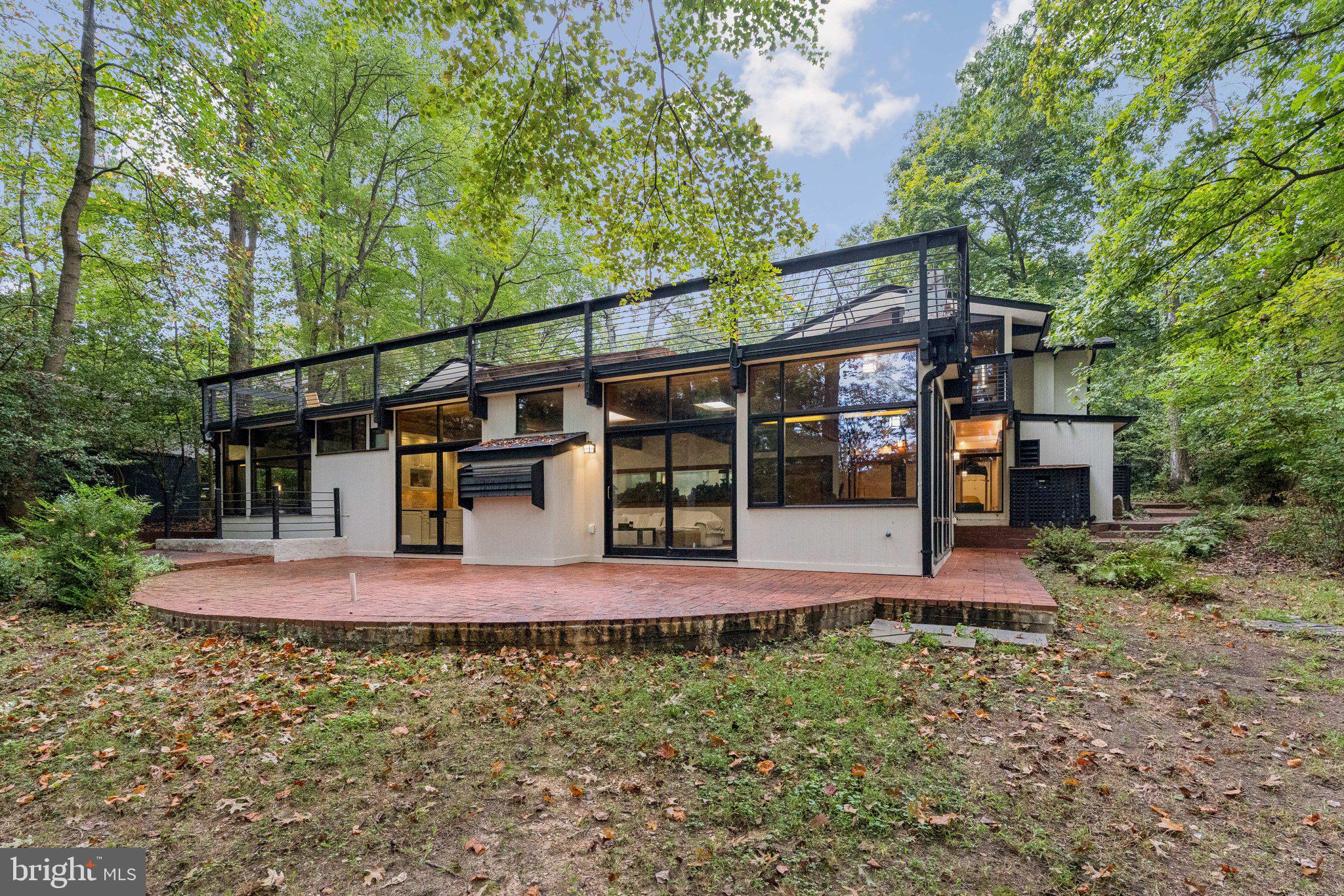 11428 Purple Beech Drive Reston, VA 20191 - Photo 2 of 52 a front view of a house with a yard