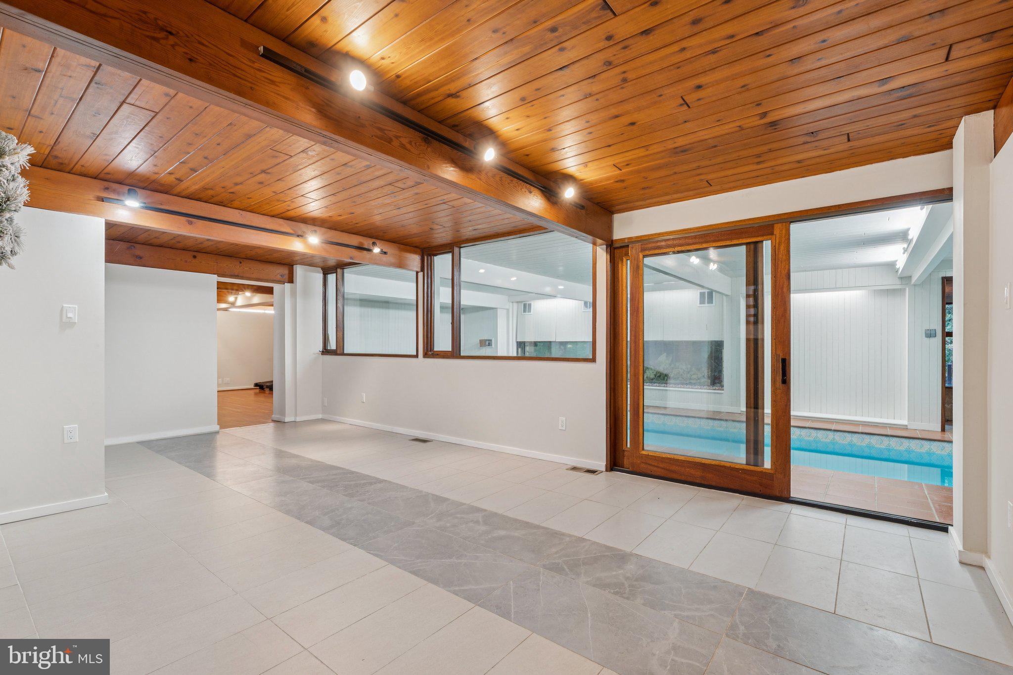 11428 Purple Beech Drive Reston, VA 20191 - Photo 29 of 52 a view of an empty room with glass door