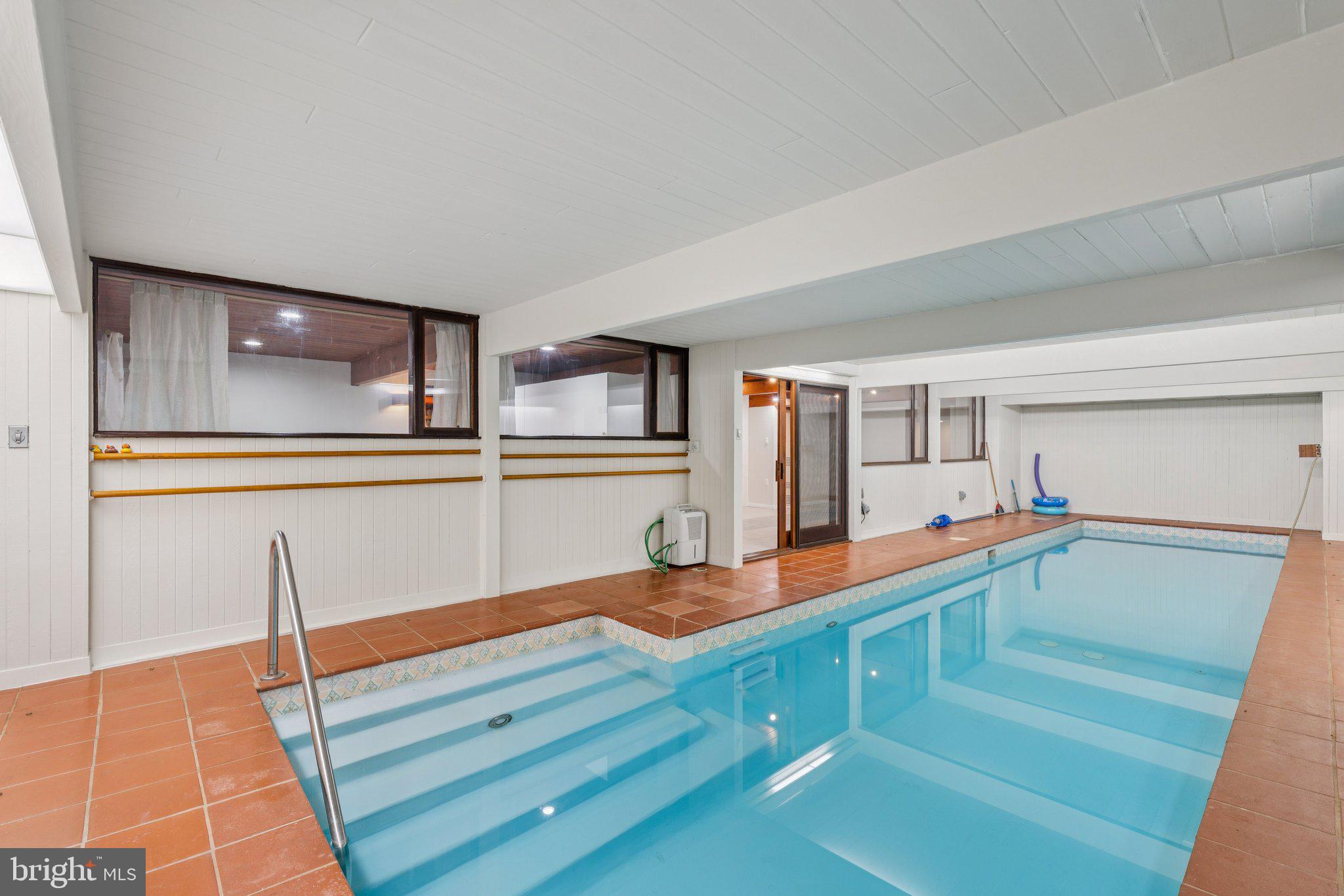 11428 Purple Beech Drive Reston, VA 20191 - Photo 31 of 52 a room with gym equipment