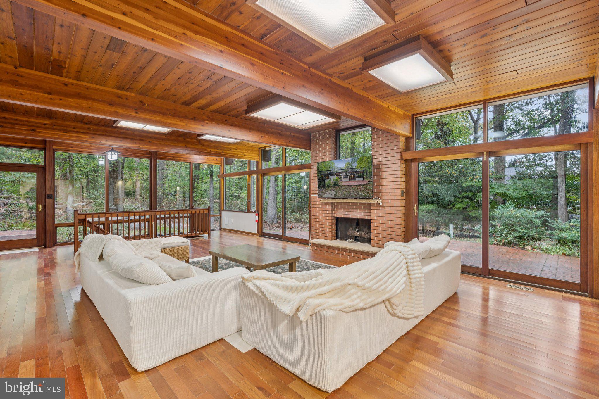 11428 Purple Beech Drive Reston, VA 20191 - Photo 37 of 52 a living room with furniture and a large window