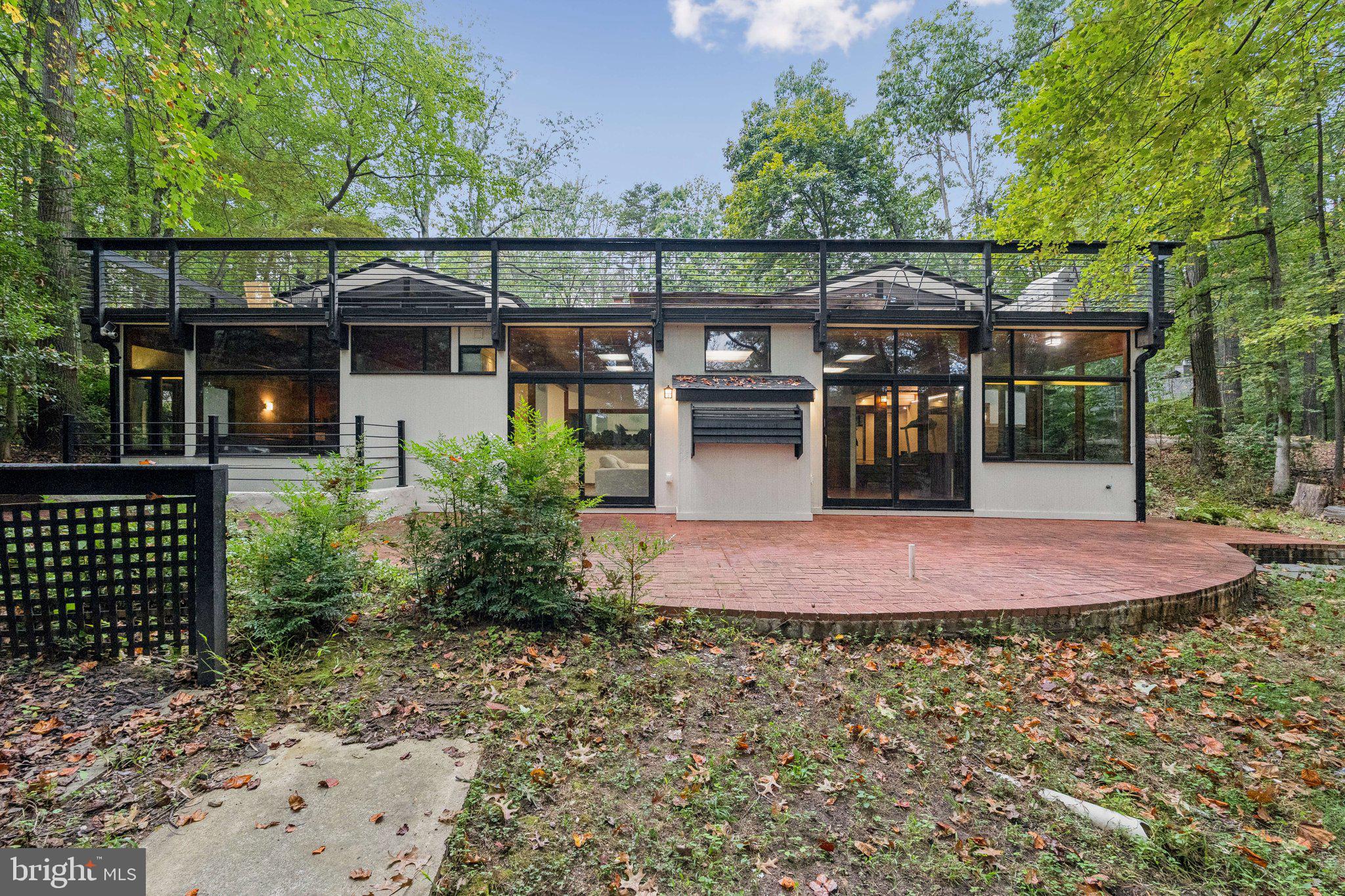 11428 Purple Beech Drive Reston, VA 20191 - Photo 4 of 52 a small garden covered with wooden fence