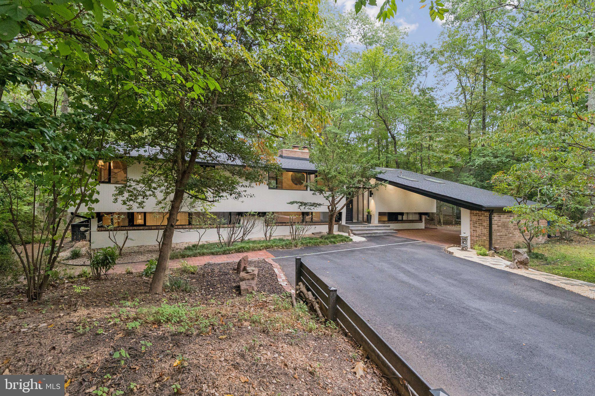 11428 Purple Beech Drive Reston, VA 20191 - Photo 51 of 52 a view of a house with a yard