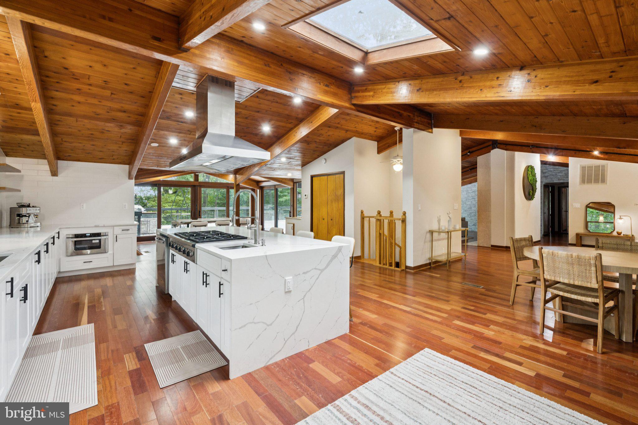 11428 Purple Beech Drive Reston, VA 20191 - Photo 10 of 52 a view of a kitchen with wooden floor