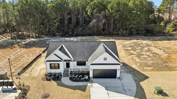 a view of house with outdoor space
