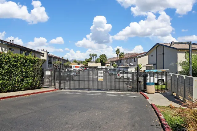 a view of a street with a garage