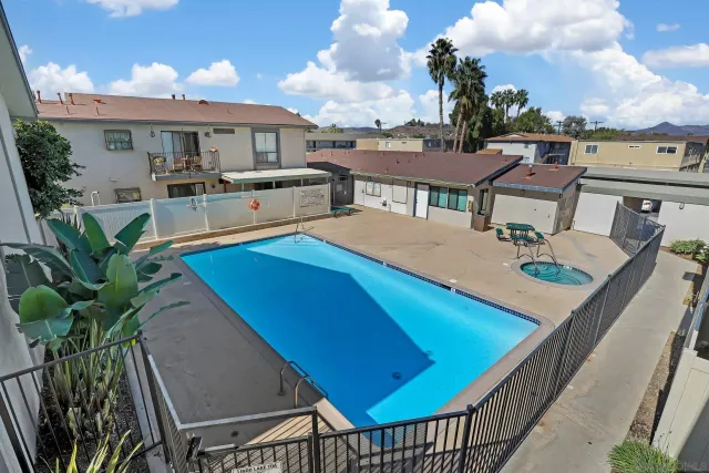 a view of a terrace with furniture and a potted plant