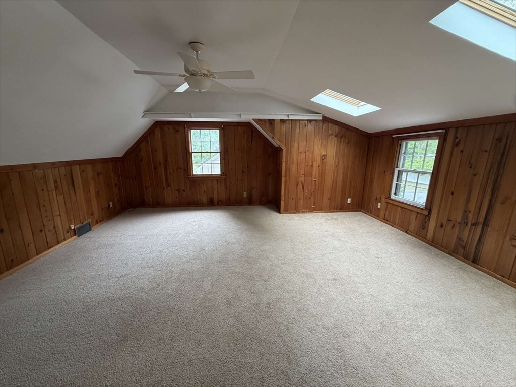 74 Birch Road Longmeadow, MA 01106 - Photo 23 of 38 an empty room with windows and cabinet