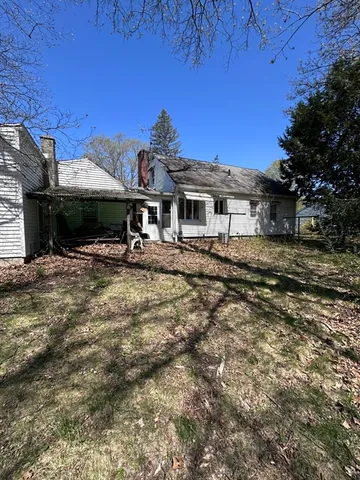 a view of a house with roof deck