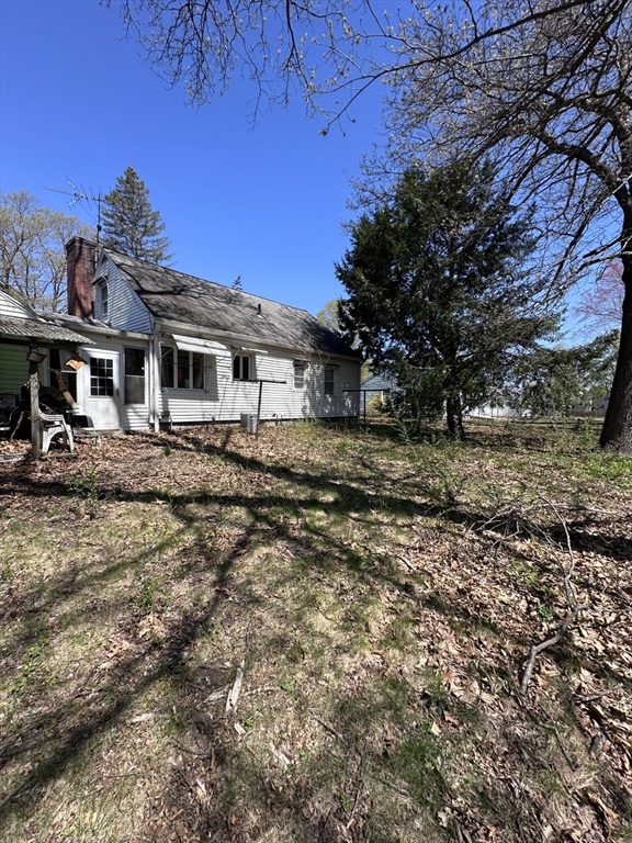514 Dewey Street West Springfield, MA 01089 - Photo 10 of 13 a front view of a house with a yard