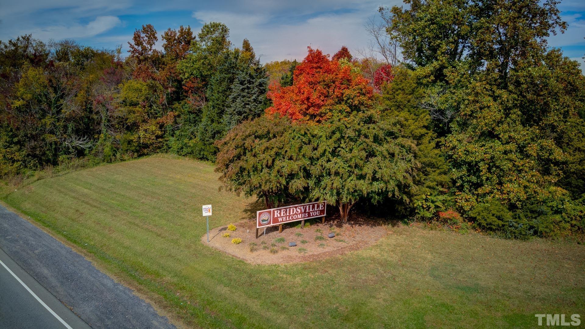 0 Adams Road Reidsville, NC 27320 - Photo 17 of 20 a backyard of a house with lots of green space