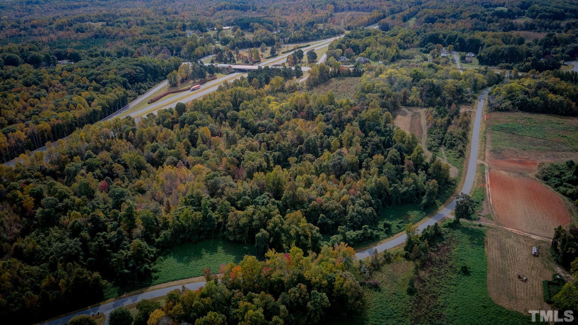 0 Adams Road Reidsville, NC 27320 - Photo 7 of 20 an aerial view of residential house with outdoor space and trees all around