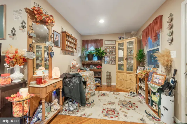 a view of a livingroom with furniture and a rug