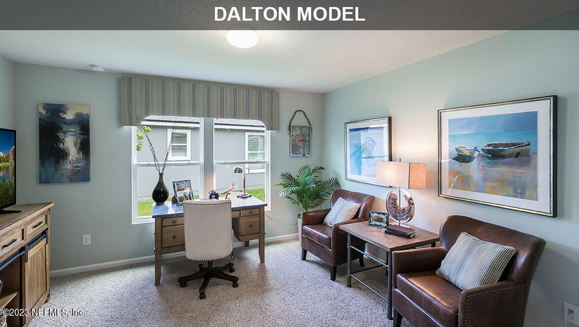 65792 Edgewater Drive Yulee, FL 32097 - Photo 16 of 45 a living room with furniture and a window