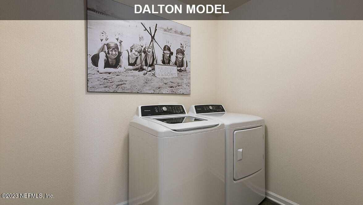 65792 Edgewater Drive Yulee, FL 32097 - Photo 17 of 45 a utility room with dryer and washer