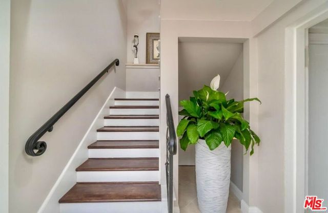 a bathroom with a sink toilet and mirror