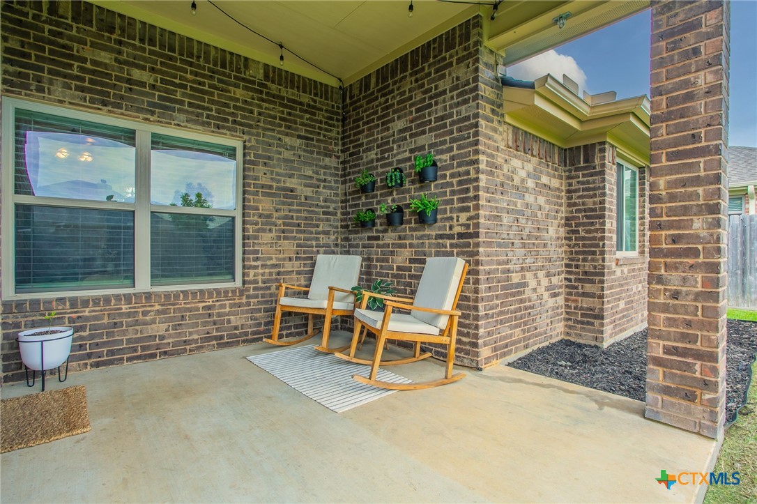 8304 Split Trl Cove Temple, TX 76502 - Photo 23 of 28 a backyard of a house with outdoor seating