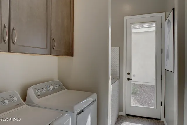 a bathroom with a sink a mirror and a shower