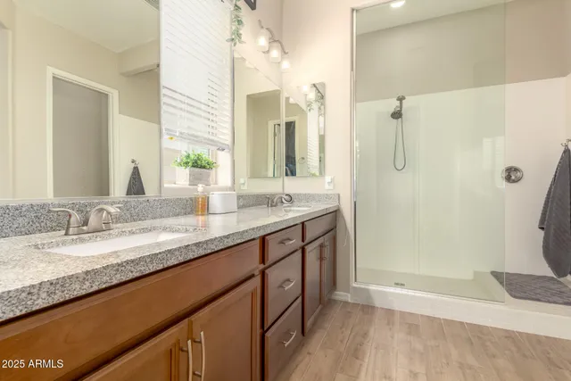 a bedroom with bed and a window