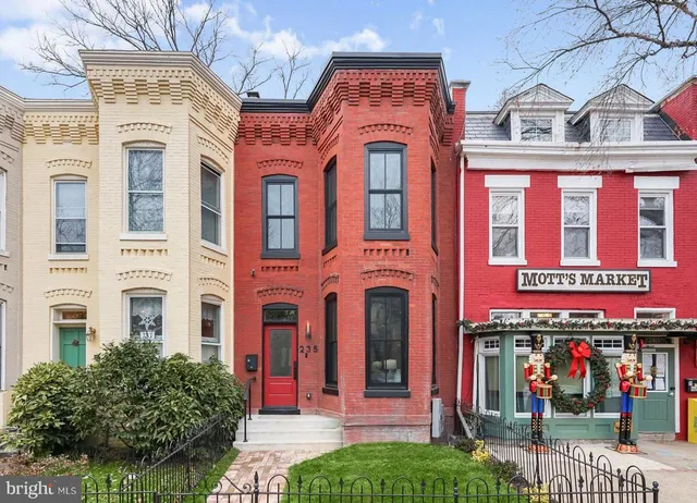 a front view of multi story residential apartment building
