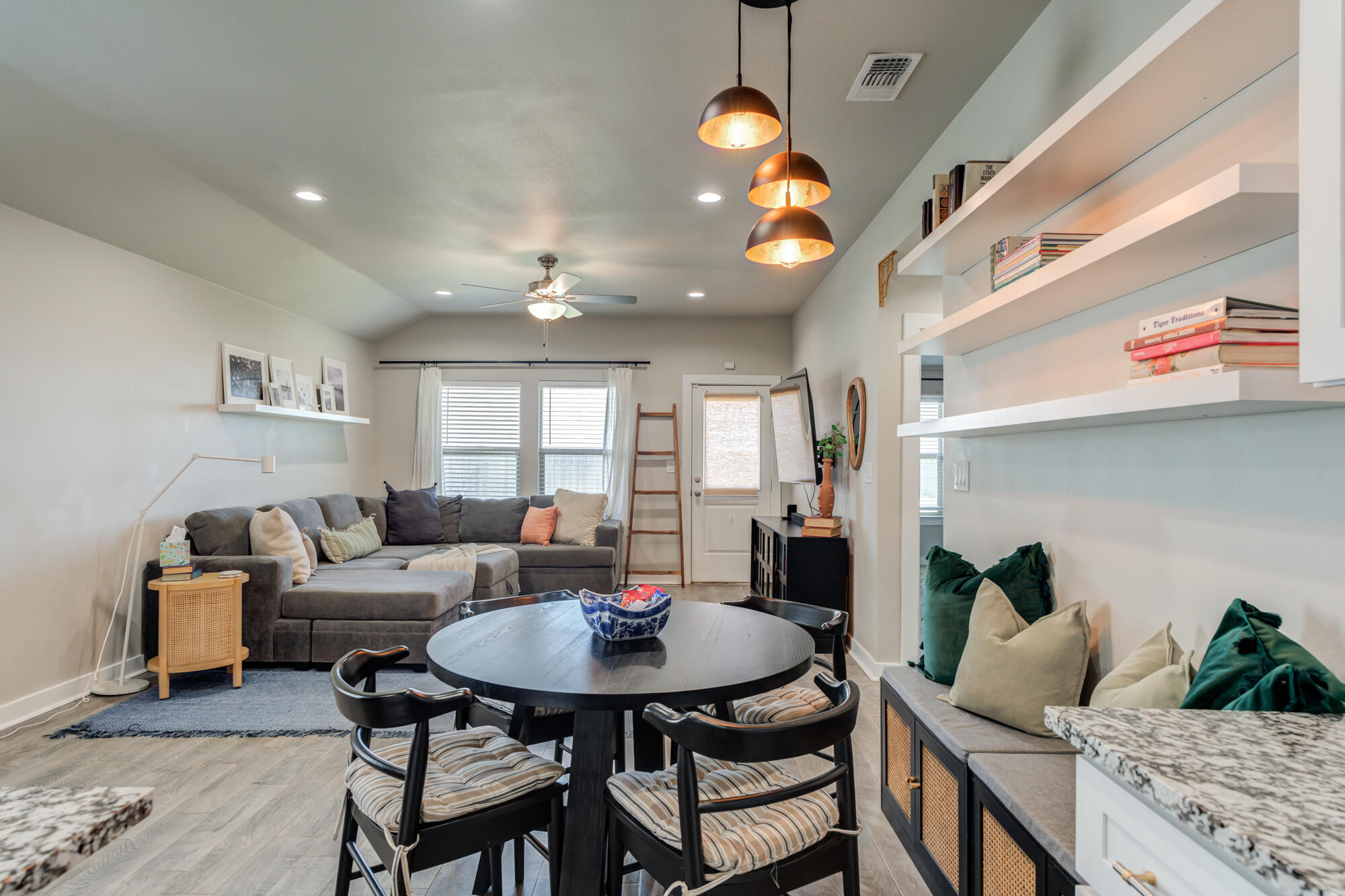 4613 126th Street Lubbock, TX 79424 - Photo 17 of 37 a living room with furniture and a chandelier