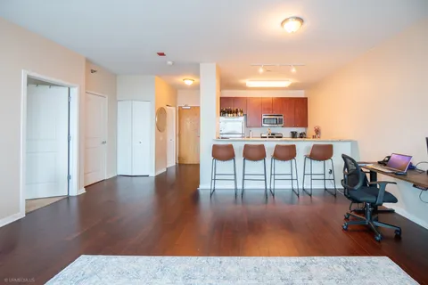 a view of a living room and dining room