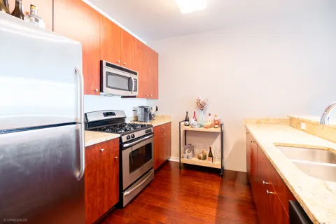a kitchen with a stove and a microwave